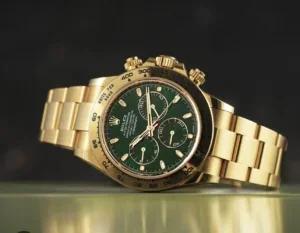 Goldene Rolex Cosmograph Daytona mit grünem Zifferblatt Uhren & Rolex-Ankauf bei Juwelier Sascha in Wien
